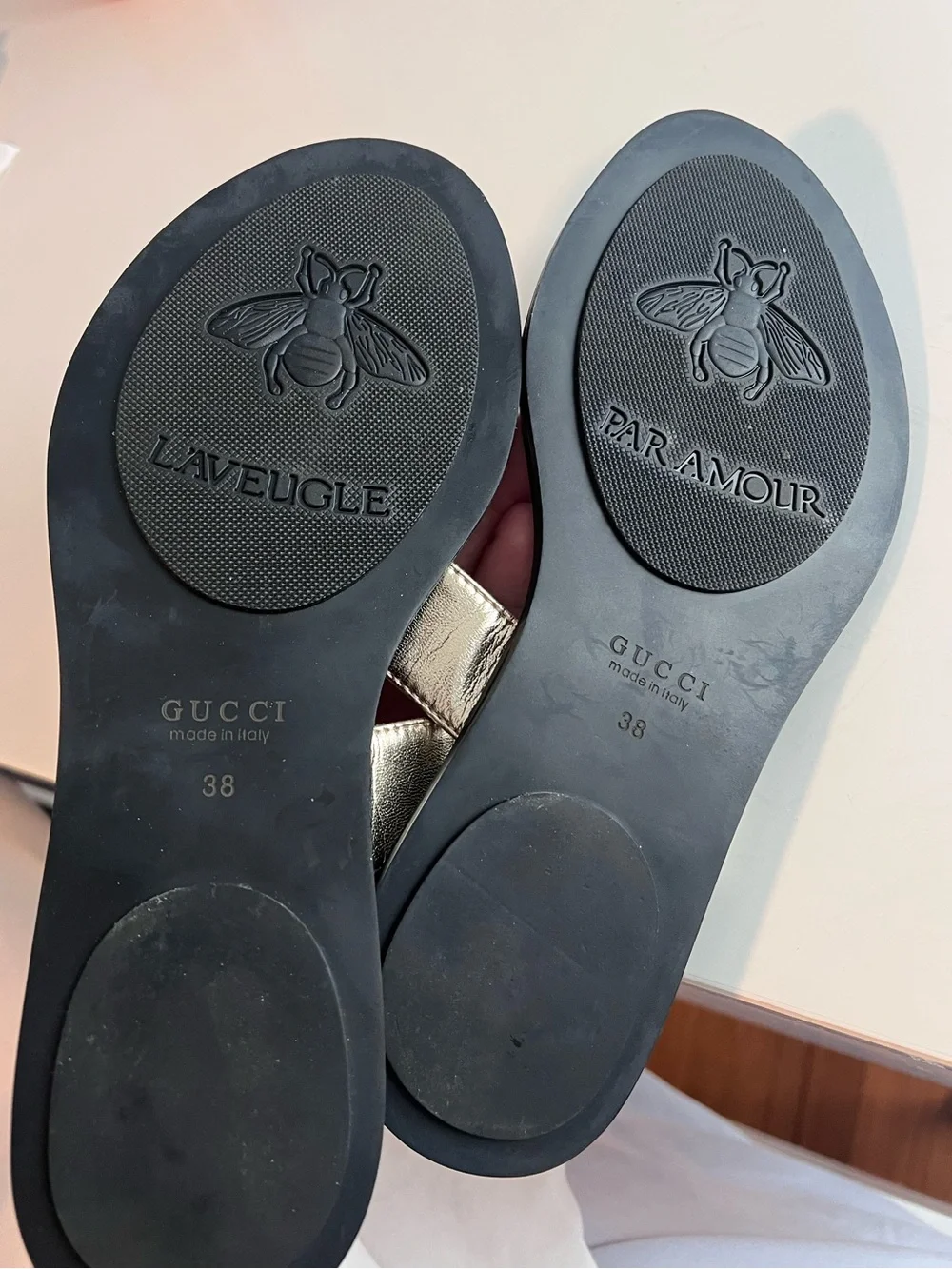 Gucci Metallic Gold Leather GG Thong Sandals with Black Footbed